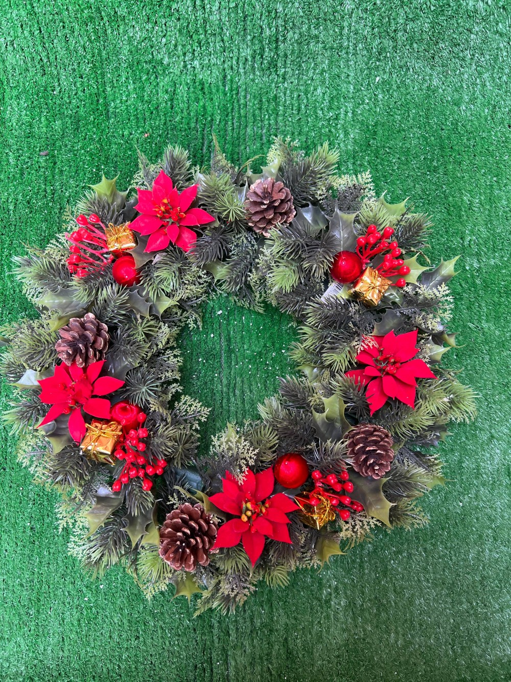 Poinsettia and cone christmas welcome door rings / grave wreaths